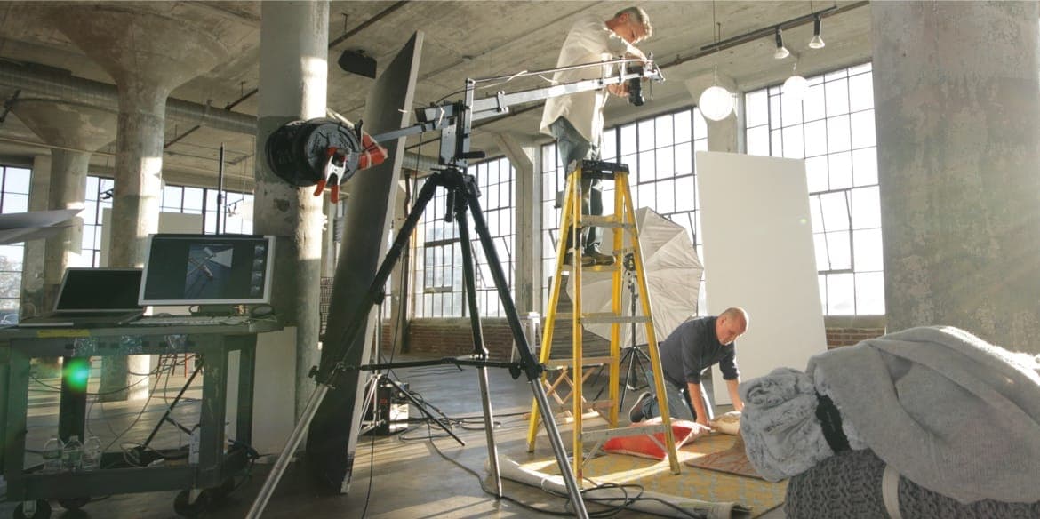 A group of people photographing Capel Rugs