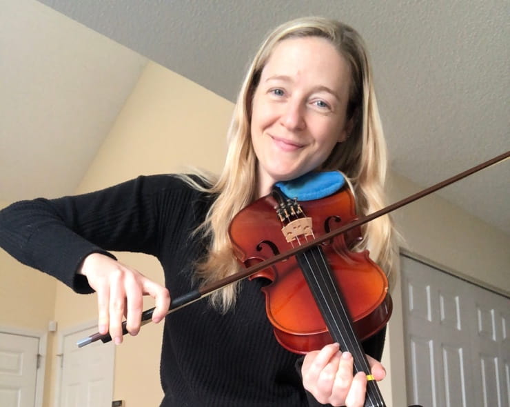 Lawson playing the violin